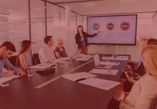 A presentation being delivered to a room